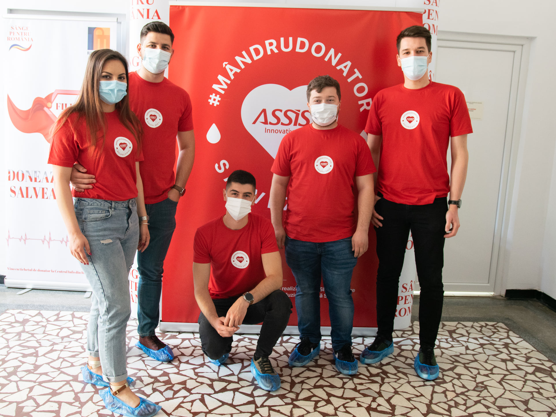 People standing, blood donation center, ASSIST Software logo