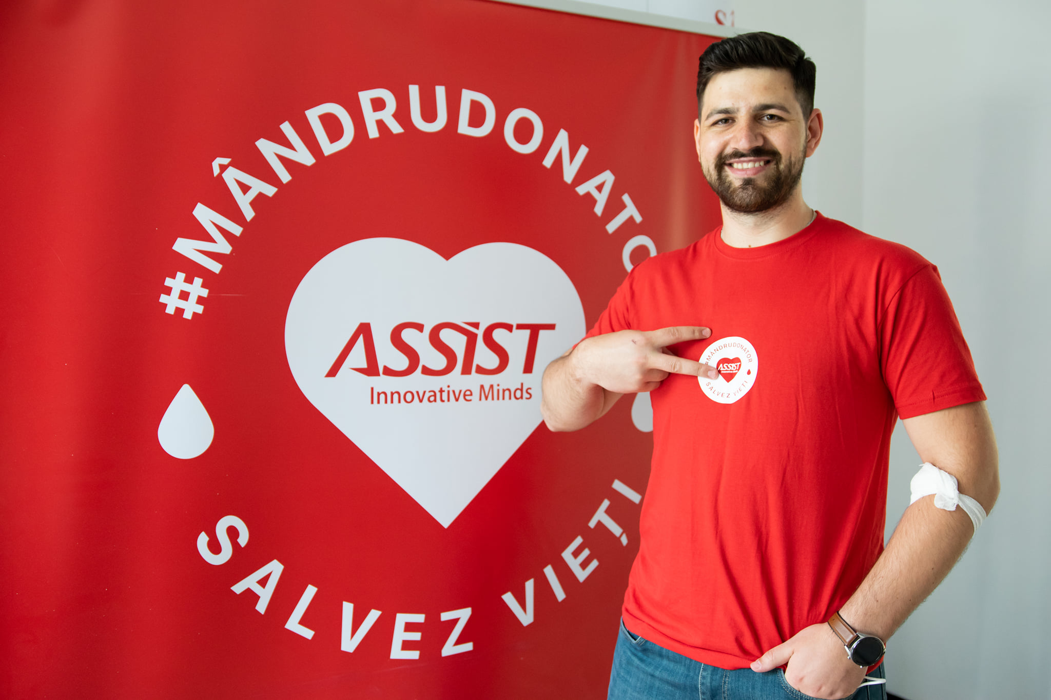 ASSIST Software logo, person standing