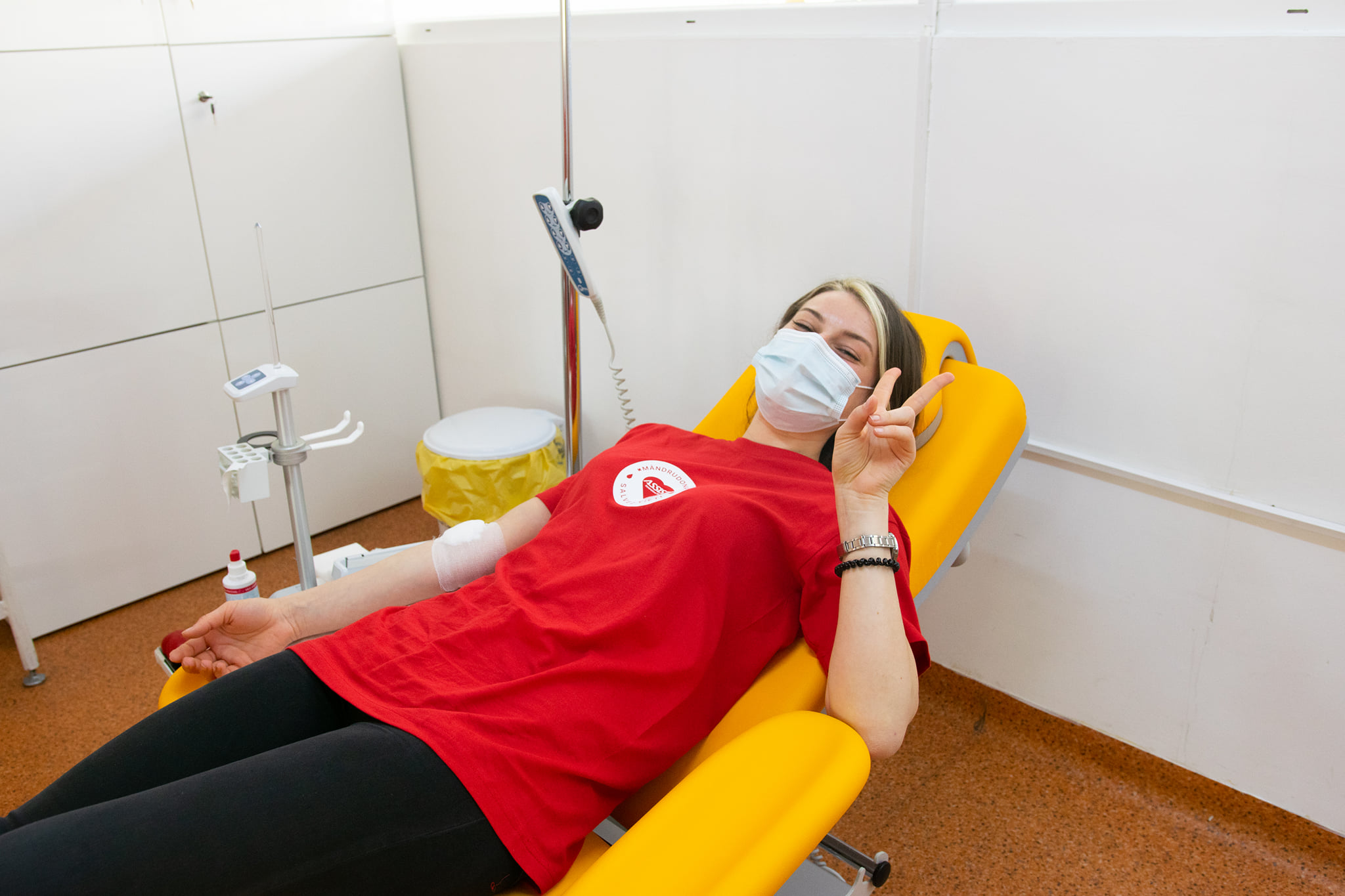 ASSIST colleague giving blood