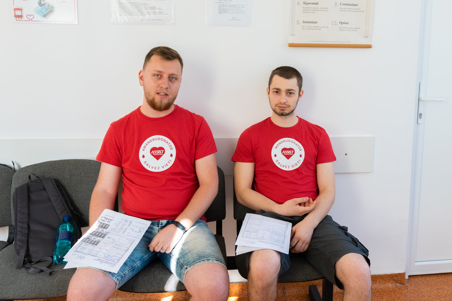 ASSIST Software employes reading the benefits of donating blood