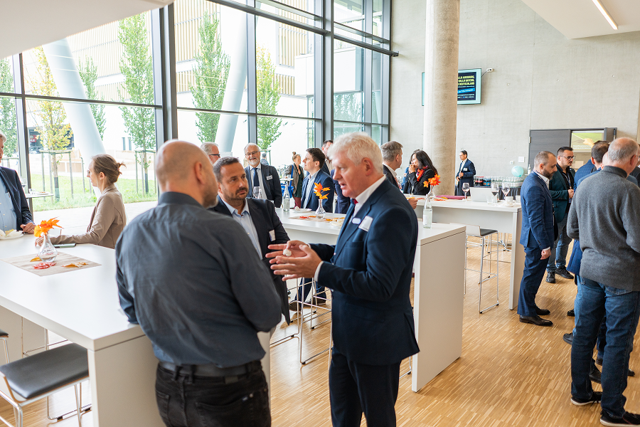 People discussing at an official event