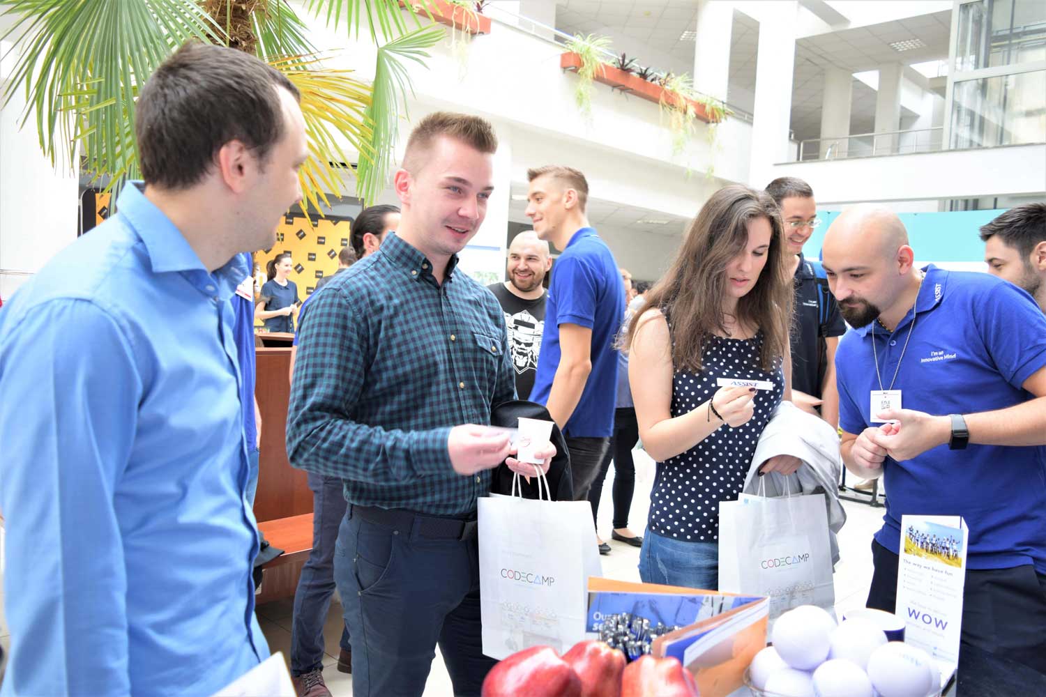 ASSIST Software representant talking with the students at Code Camp Suceava