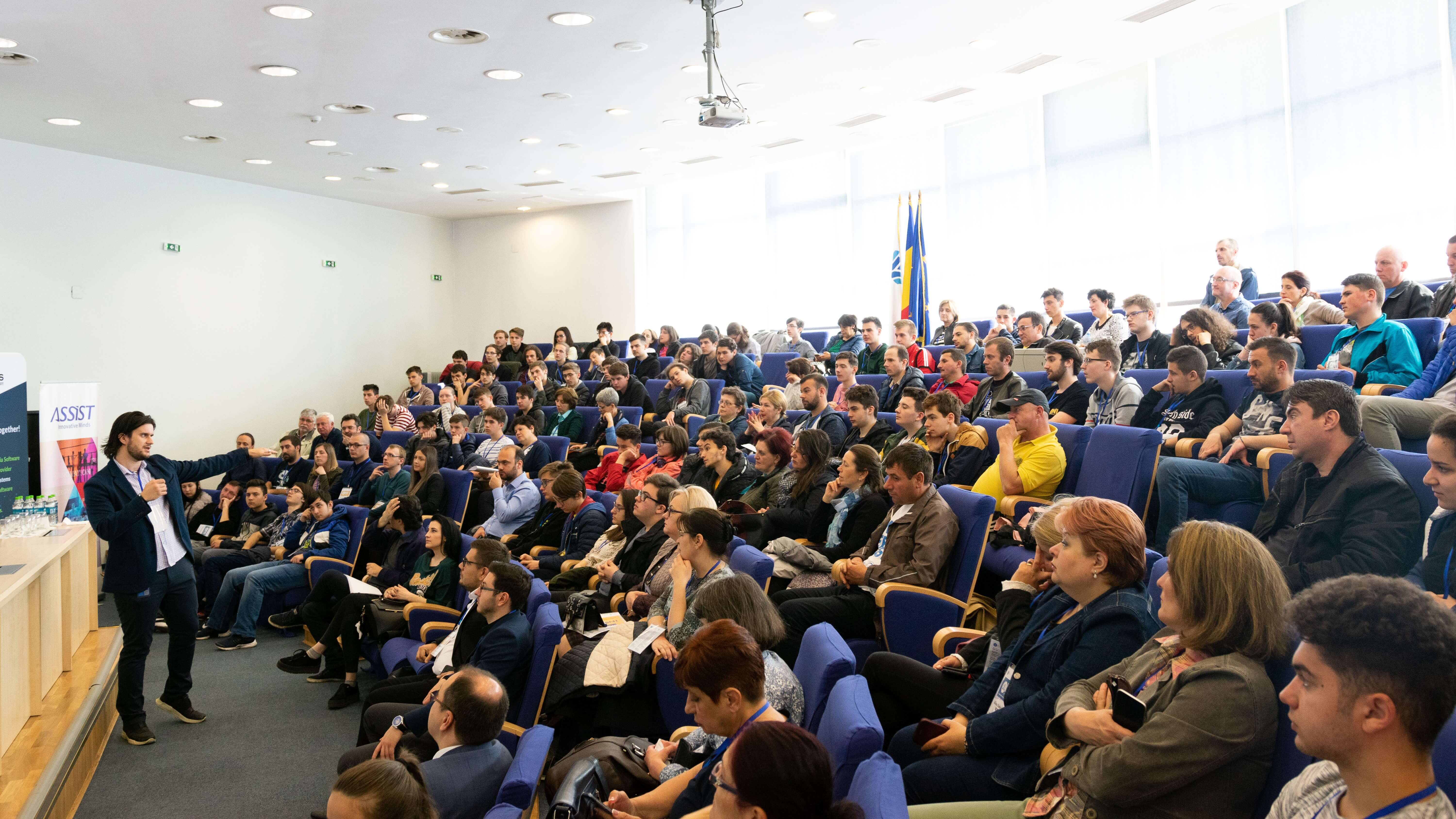 ASSIST Software representative Alexandru Boca, talking in front of high school students at the National Olympiad in Informatics 2019