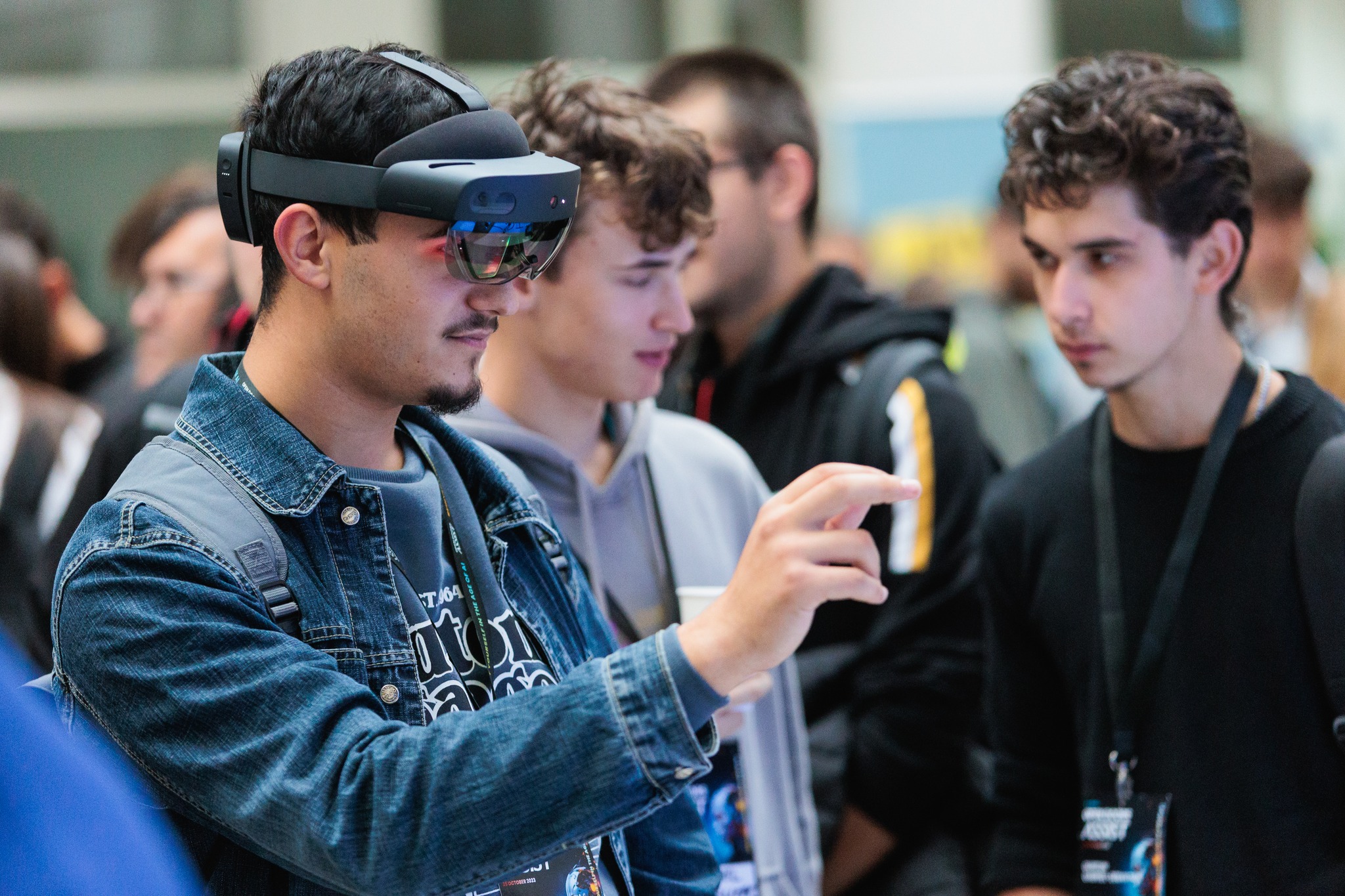 Student trying on VR glasses at ASSIST Open Doors