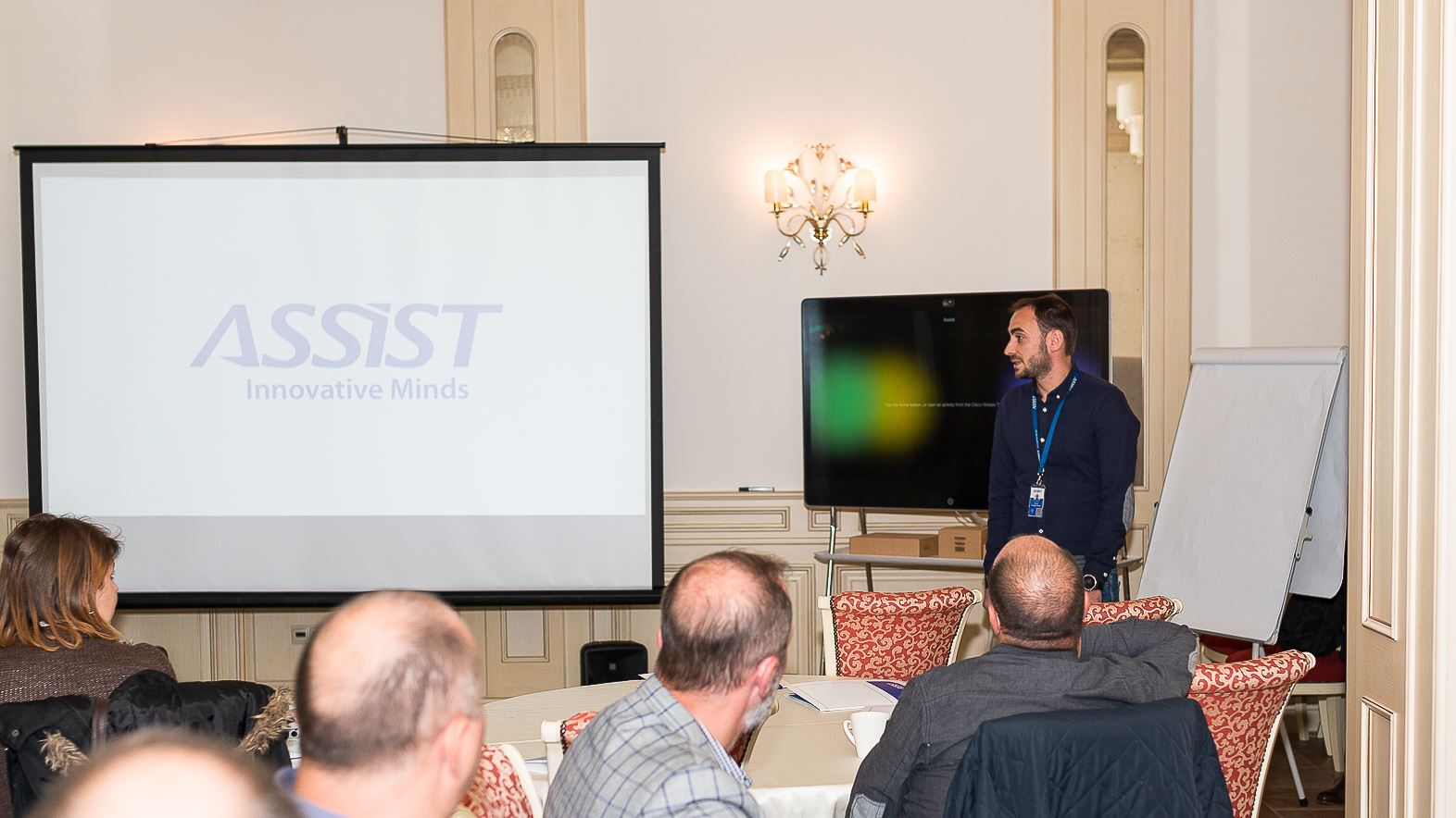 Adrian Onu - COO at ASSIST Software speaking in front of the audience from Connect Bucovina event