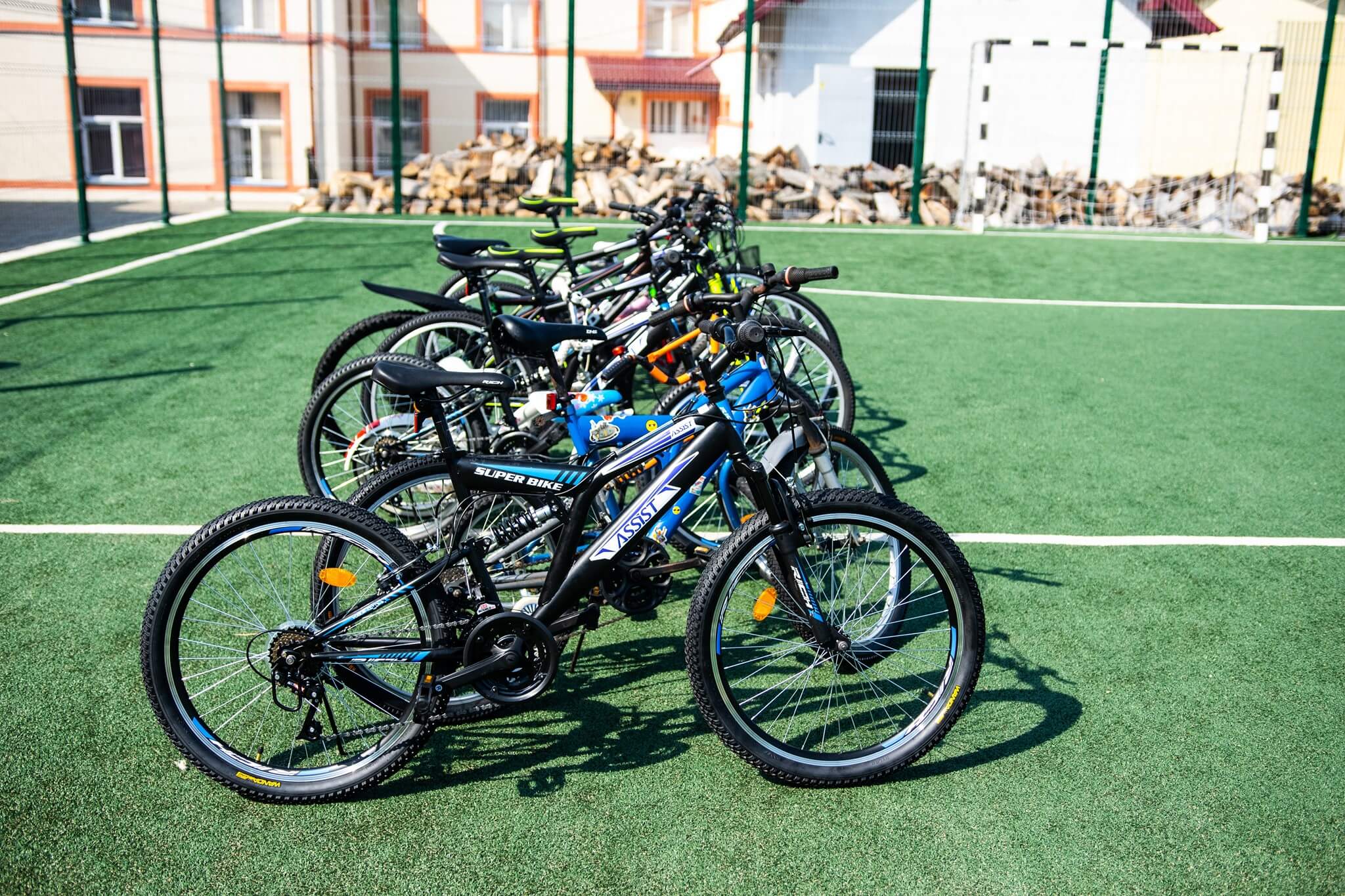 ASSIST Software donates 14 bicycles  